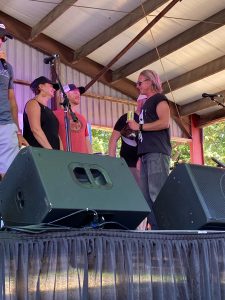 Shelby, Kirk on stage with Jon Foreman